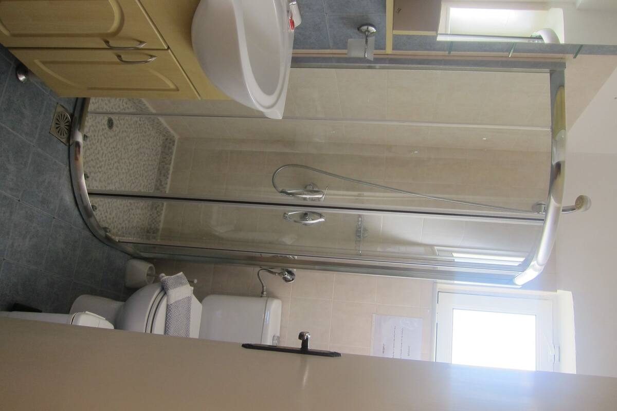 ground floor studios | bathroom | shower, hair dryer, towels
