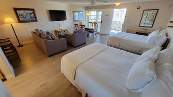 Tabla de planchar con plancha, wifi gratis y ropa de cama