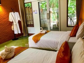 Habitación estándar con 1 cama doble o 2 individuales, vistas al jardín | Wifi gratis y ropa de cama