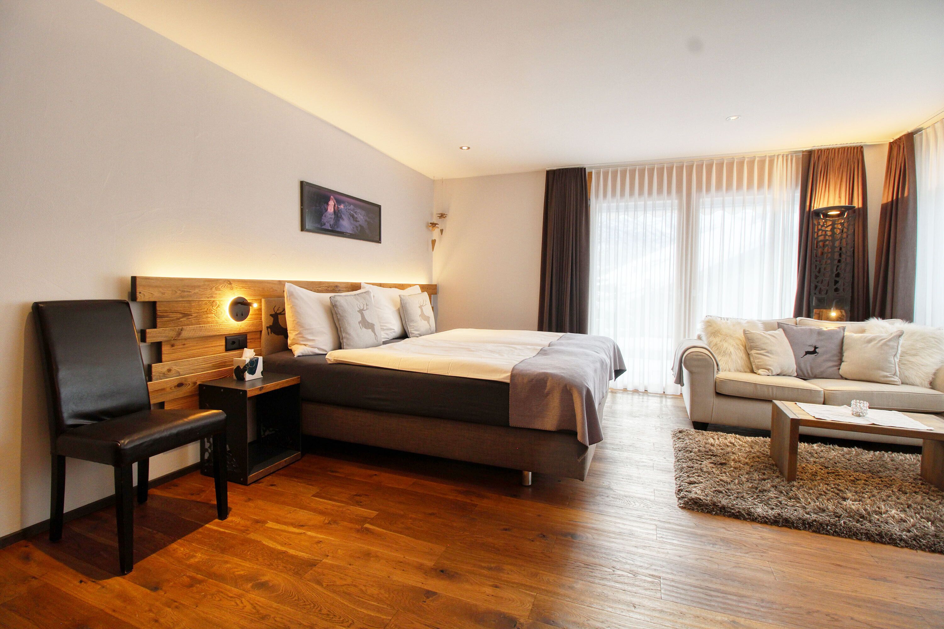 Apartemen, 2 Tempat Tidur Twin, teras | Area keluarga | TV layar datar, pemutar DVD, dan lantai berpemanas