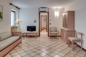 Comfort Apartment, 2 Bedrooms | Living area | TV - Residence La Filanda (Costermano sul Garda)