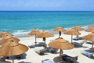 Private beach, sun loungers, beach umbrellas, beach towels