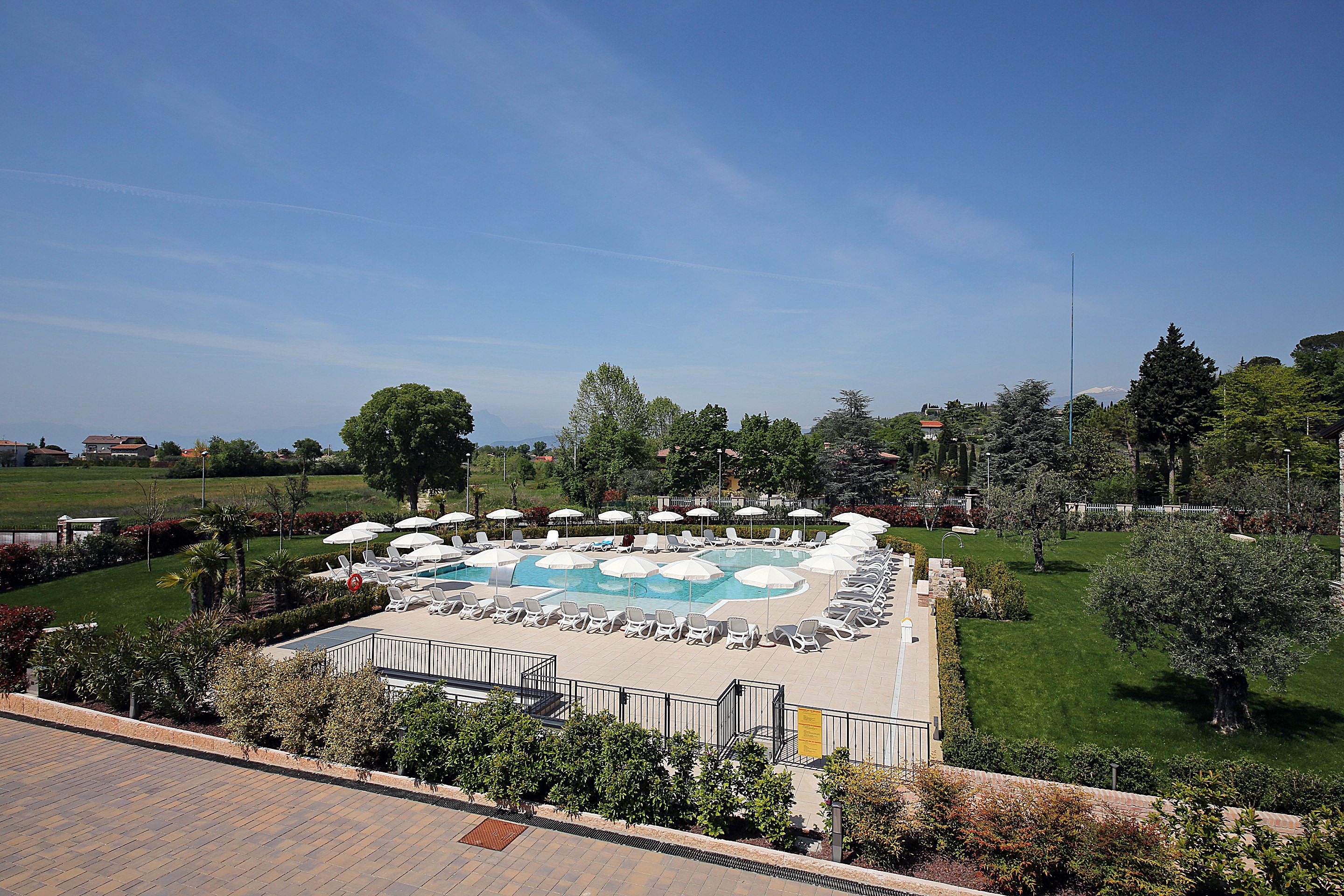 Outdoor pool, pool umbrellas, pool loungers