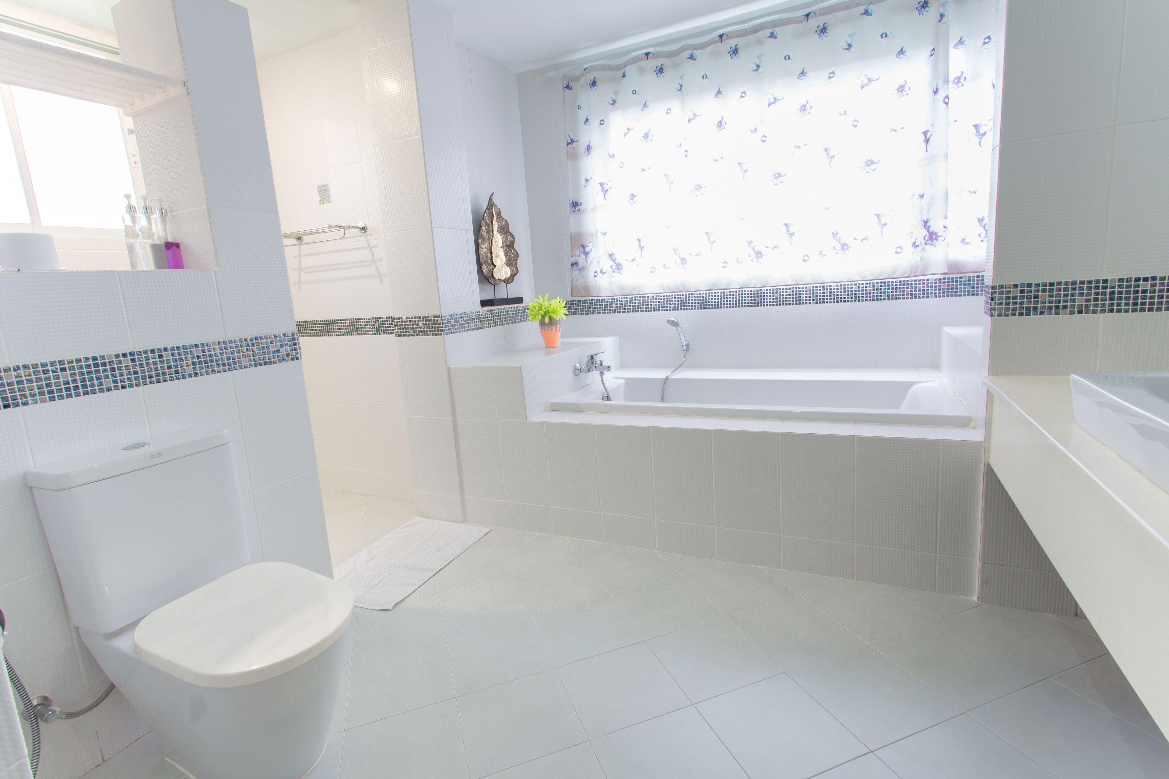 junior double room, garden view | bathroom | shower, free toiletries, hair dryer, bathrobes