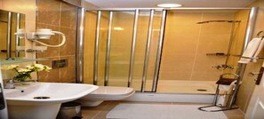 Shower, rainfall showerhead, designer toiletries, hair dryer