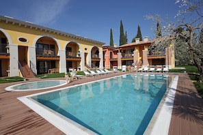 Seasonal outdoor pool, pool loungers