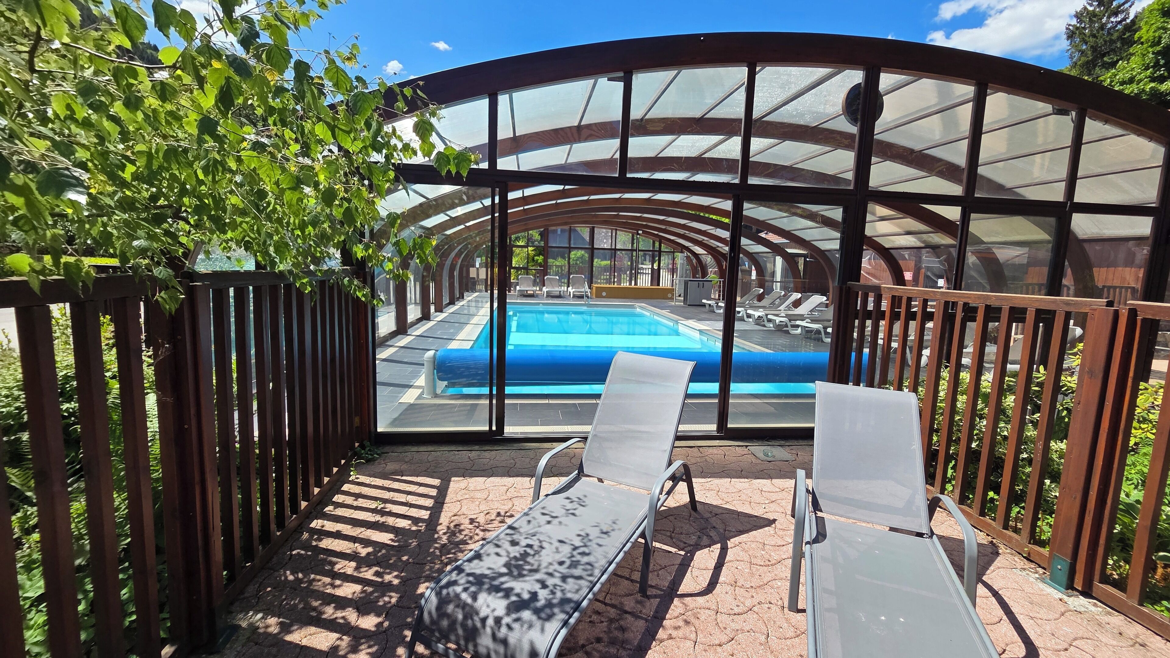 Indoor pool, open 10:00 AM to 7:00 PM, pool loungers