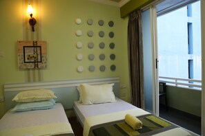 Deluxe Double or Twin Room, City View | Balcony