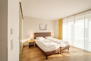 Premium bedding, desk, soundproofing, iron/ironing board