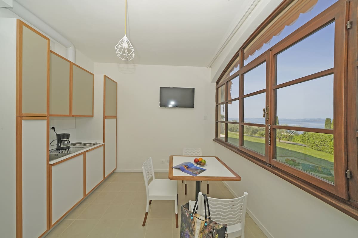 Apartment, 1 Double Bed | Living area | 15-inch TV with digital channels