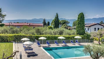 Outdoor pool, pool umbrellas, pool loungers