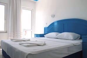 Habitació estàndard | Llençols de cotó egipci, roba de llit d'alta qualitat i cobrellits