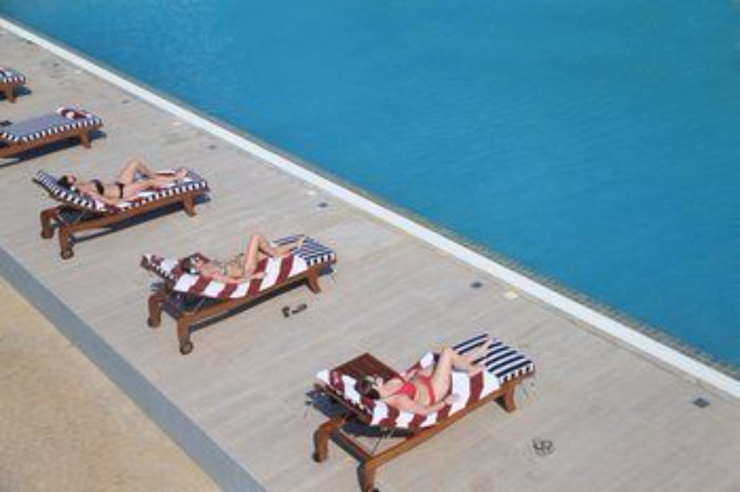 2 outdoor pools, pool umbrellas, pool loungers