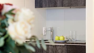 Deluxe Triple Room, 1 King Bed with Sofa bed, Kitchenette | In-room safe, desk, soundproofing, iron/ironing board