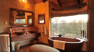 Separate tub and shower, deep soaking tub, free toiletries, hair dryer