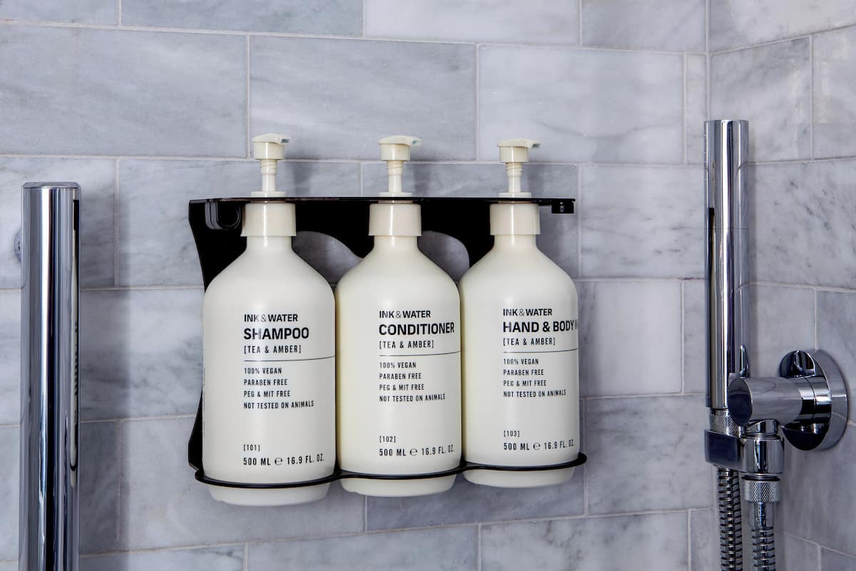 Shower, rainfall showerhead, designer toiletries, hair dryer