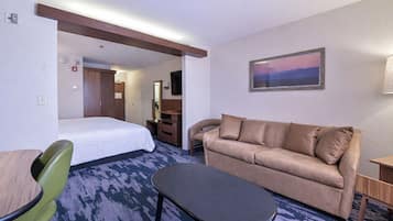 Desk, laptop workspace, blackout drapes, iron/ironing board