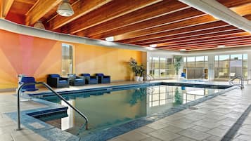 Indoor pool, open 7:00 AM to 10:00 PM, pool loungers