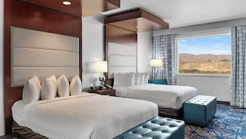 Premium bedding, down duvets, pillow-top beds, in-room safe