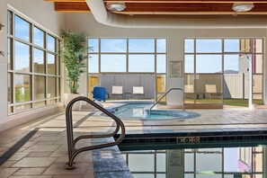 Indoor pool, open 7:00 AM to 10:00 PM, pool loungers
