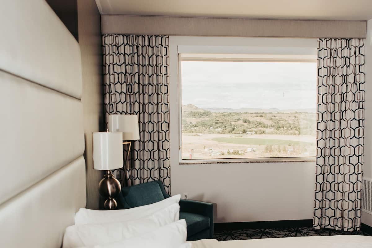 premium room, 1 king bed | premium bedding, down duvets, pillow-top beds, in-room safe