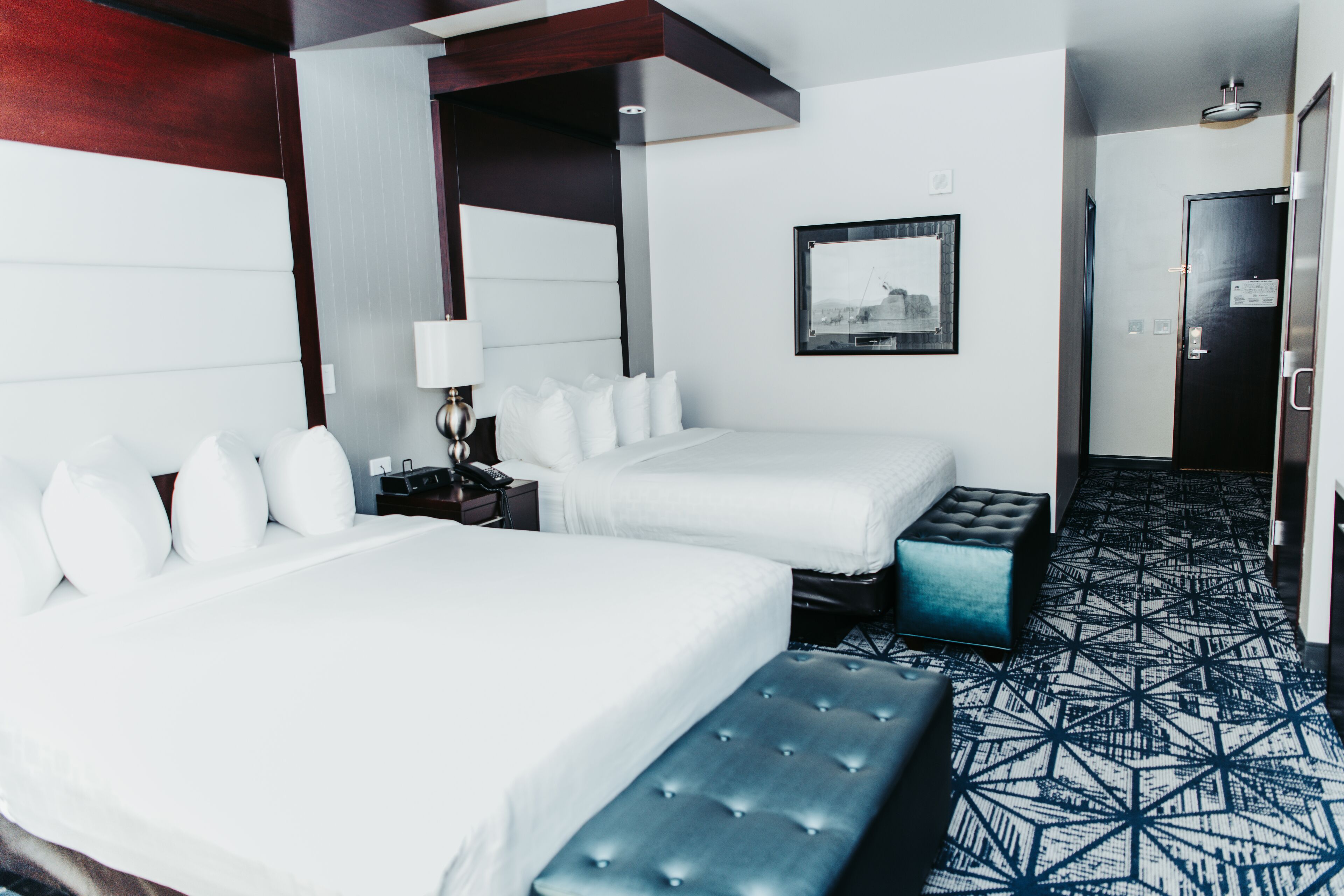 deluxe room, 2 queen beds | premium bedding, down duvets, pillow-top beds, in-room safe