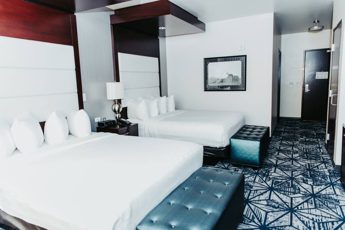 deluxe room, 2 queen beds | premium bedding, down duvets, pillow-top beds, in-room safe