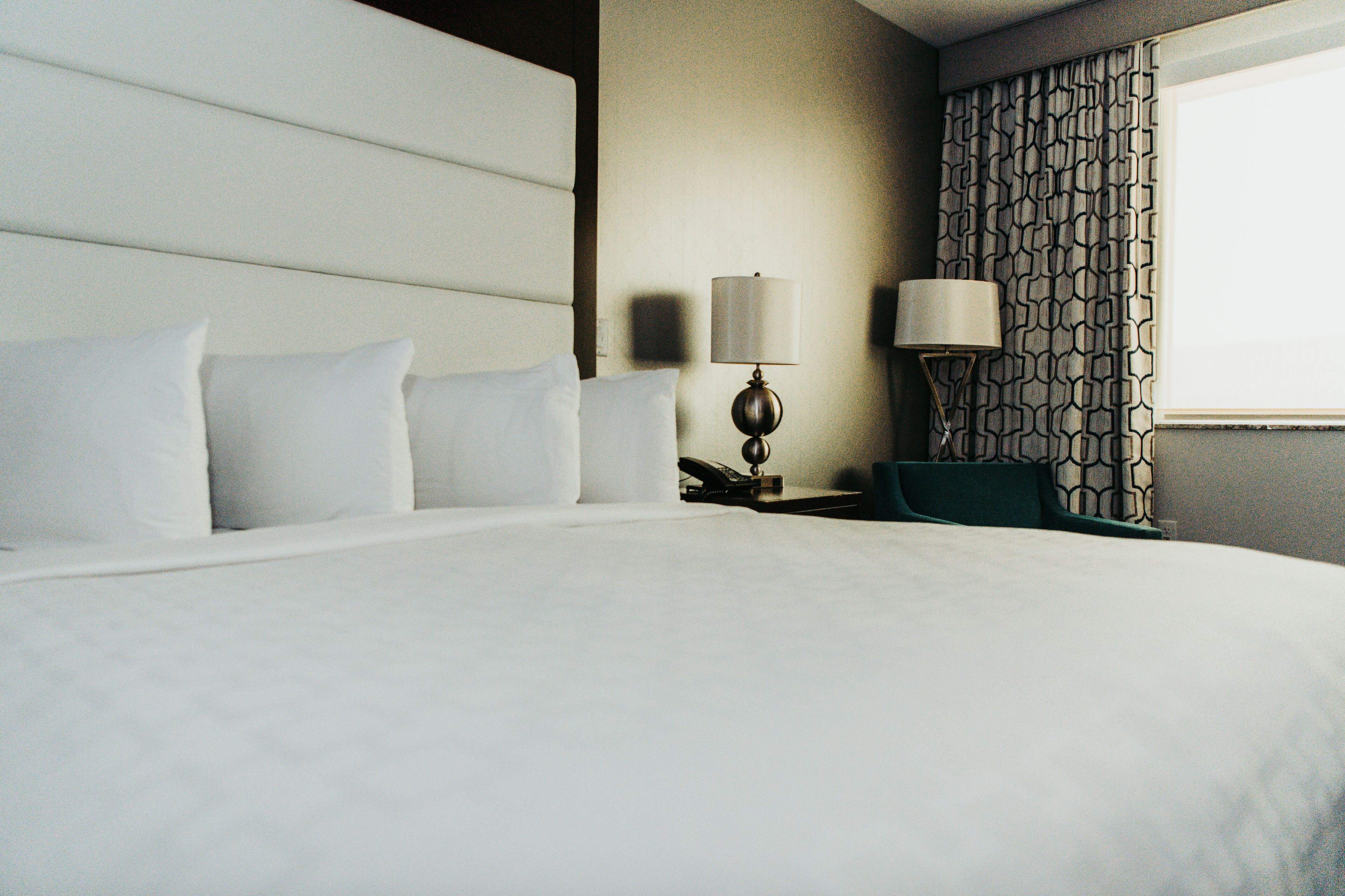 deluxe room, 1 king bed | premium bedding, down duvets, pillow-top beds, in-room safe