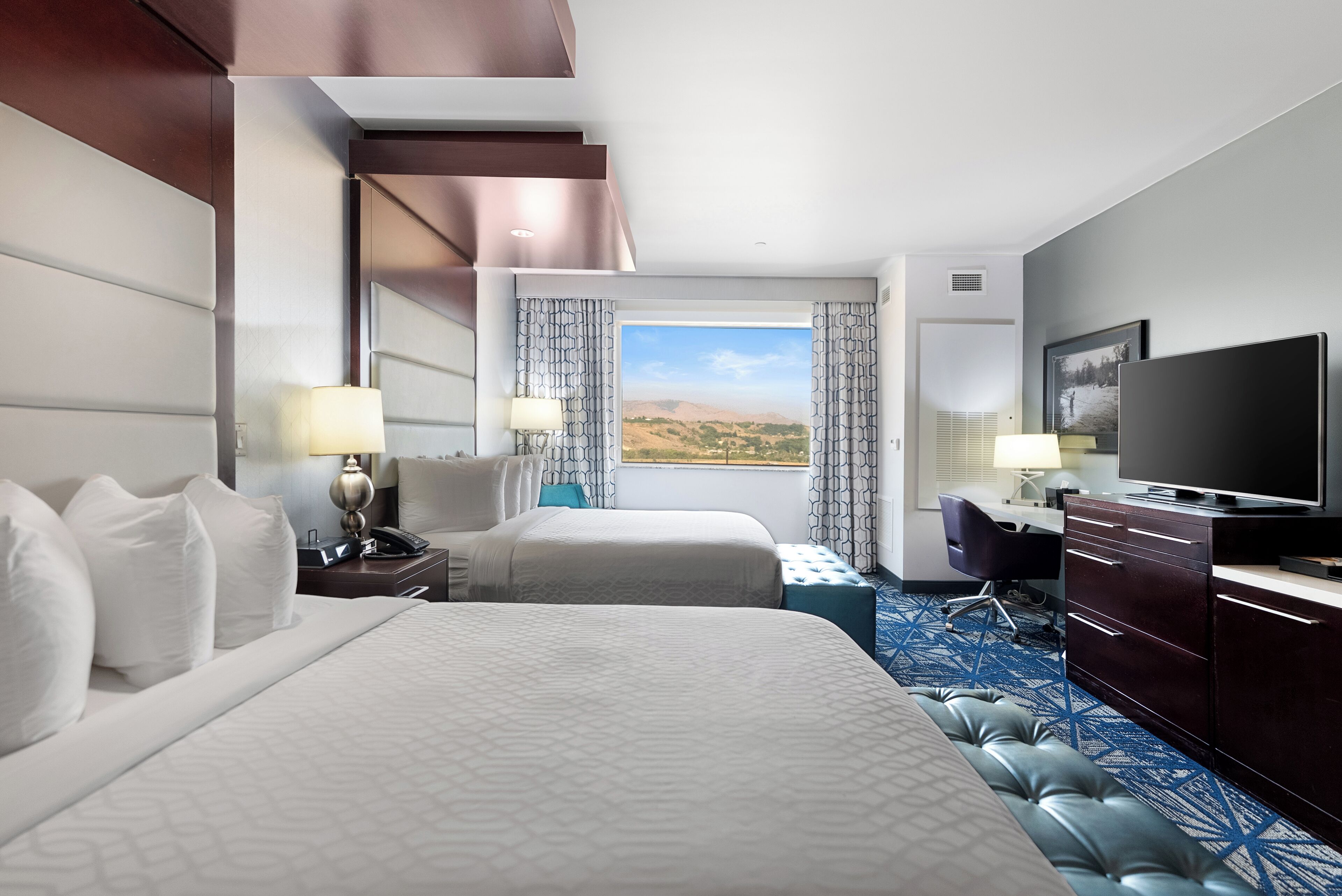 Premium bedding, down comforters, pillowtop beds, in-room safe