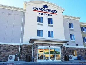 A hotel named Candlewood Suites with a modern facade, large windows, and a clear entrance. - Candlewood Suites MORGANTOWN-UNIV WEST VIRGINIA by IHG (Morgantown)