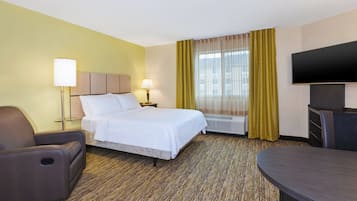 Rideaux occultants, chambres insonorisées, fer et planche à repasser