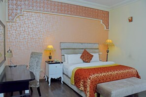 Premium bedding, down comforters, Tempur-Pedic beds, minibar