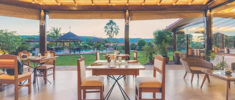 Lunch, dinner, brunch served; international cuisine, pool views