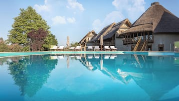 Seasonal outdoor pool, pool loungers