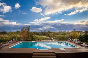 Seasonal outdoor pool, pool loungers