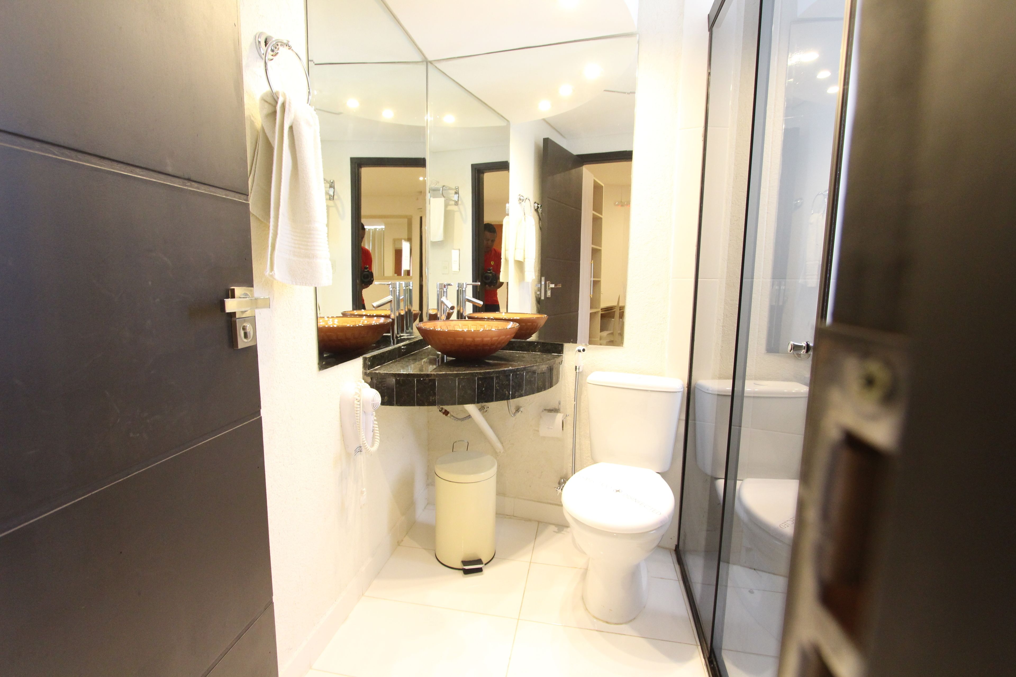 shower, hair dryer, bidet, towels