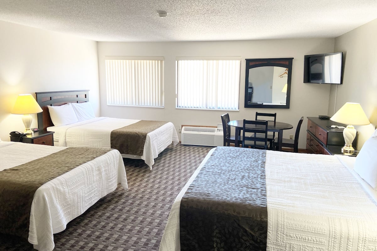 Suite, Multiple Beds | 1 bedroom, iron/ironing board, free WiFi, bed sheets