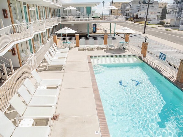 2 outdoor pools, open 10:00 AM to 8:30 PM, pool umbrellas, pool loungers