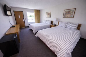 Suite, Non Smoking (1 King & 1 Queen) | Desk, iron/ironing board, free WiFi, bed sheets