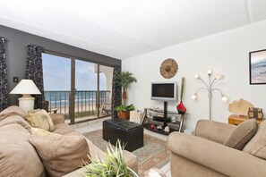 Standard Condo, 2 Bedrooms, 2 Bathrooms, Beach View (#1) | Living room | LCD TV, DVD player - Florence by South Padre Condo Rentals (South Padre Island)
