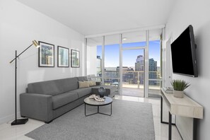 Suite, 1 King Bed with Sofa bed (One Bedroom Suite & Office) | Living area