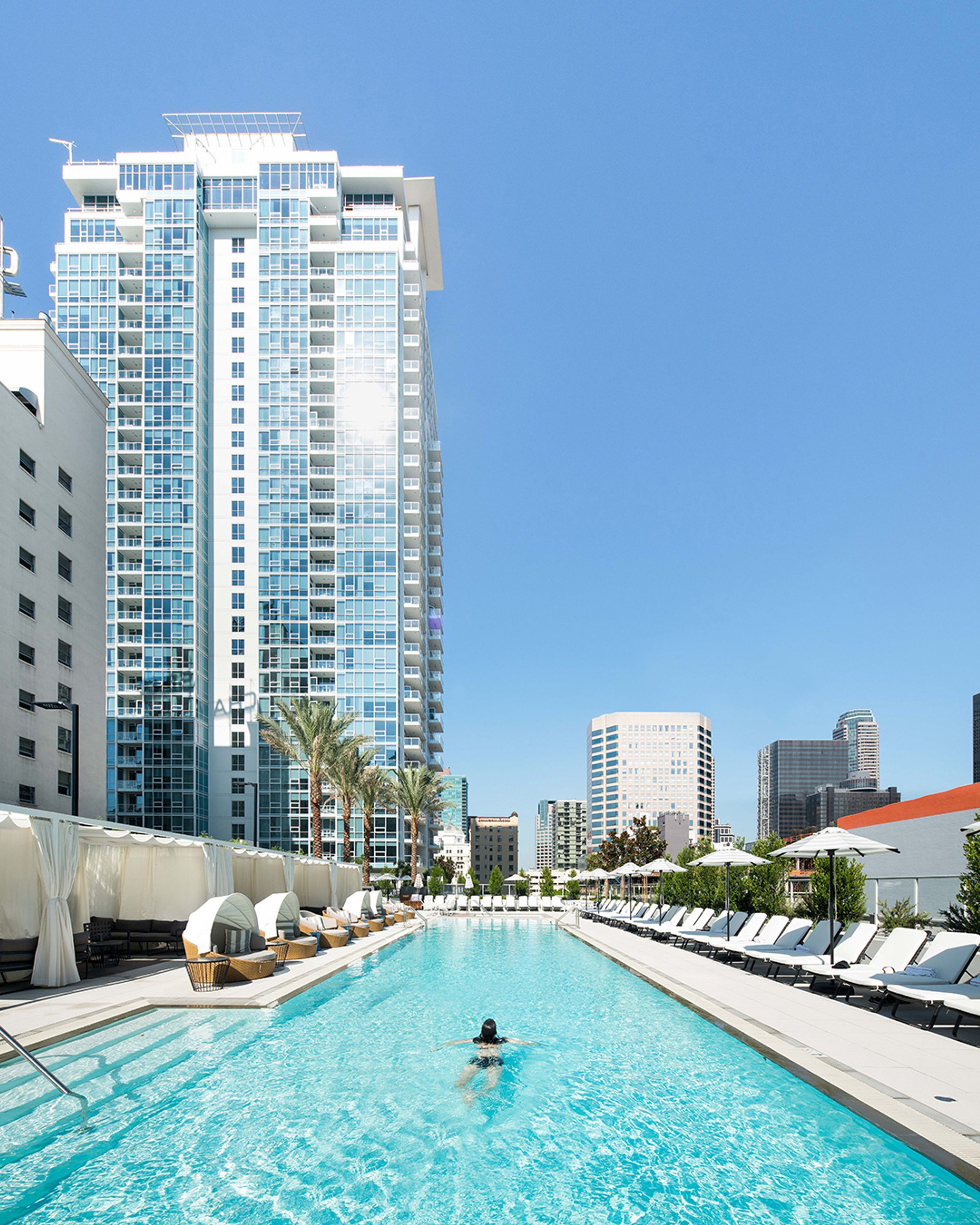 Outdoor pool, open 7 AM to 10 PM, free pool cabanas, pool loungers