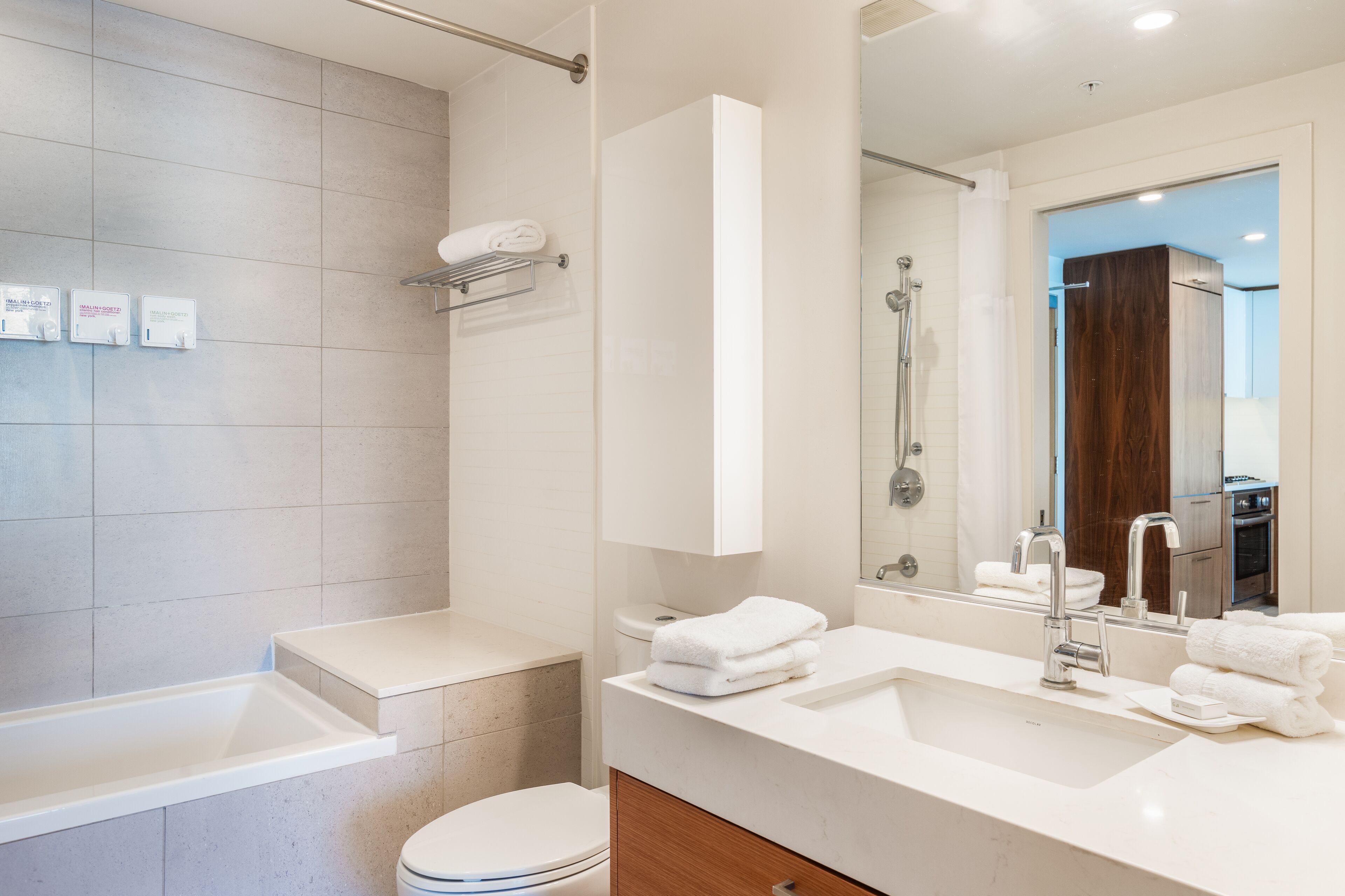 suite, 1 king bed with sofa bed (one bedroom suite) | bathroom | combined shower/bathtub, free toiletries, hair dryer, bathrobes