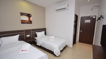 A hotel room with two beds, a painting on the wall, an air conditioning unit, and a door with a coat rack.
