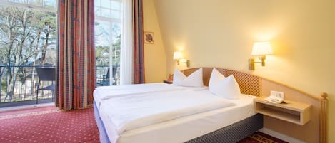 Cortinas blackout, insonorización, wifi gratis y ropa de cama