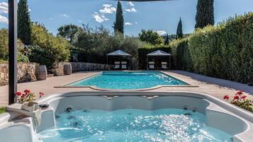 Outdoor pool, pool umbrellas, sun loungers