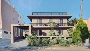 A modern building with a sign reading "MARITTE". - Mariette Rhodes Urban Suites  (Rhodes)
