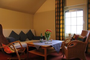 Family Suite, 2 Bedrooms | Living area | Computer monitors