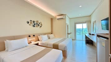 Deluxe Twin Room, City View | Individually decorated, desk, laptop workspace, blackout drapes