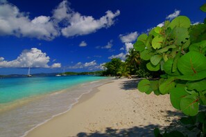 Private beach, white sand, beach towels, scuba diving